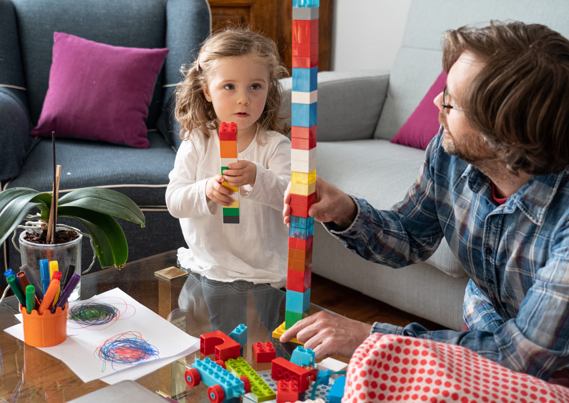 child building with blocks